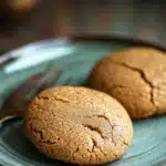 Close-up of banana cake mix cookies on a white plate with a clean background.