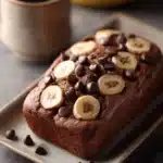 Close-up of chocolate espresso banana bread with a rich, moist texture.