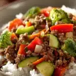 Close-up of a colorful dish with ground beef and vegetables for dinner, bright and appetizing.