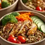 Close-up of a healthy lunch meal prep with vegetables and grains in a bright setting