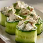 Close-up of high protein chicken salad cucumber roll with fresh ingredients
