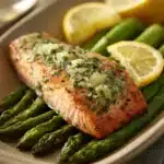 Close-up of Lemon Herb Butter Salmon and Asparagus with bright, natural lighting.