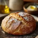 Close-up of freshly baked no yeast olive oil bread with a golden crust.