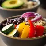 Close-up of a vibrant vegetarian meal prep with fresh vegetables and herbs