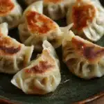 Close-up of beef chicken dumplings with a clean, minimal background.
