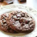 Close-up of a double chocolate cookie with a chewy texture on a clean background