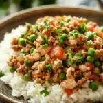 Close-up of a delicious ground turkey and rice dish with vibrant colors and appetizing presentation.