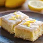 Close-up of lemon cake squares with a bright and appetizing presentation.
