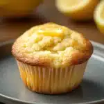 Close-up of freshly baked muffin limone yogurt with a golden crust and soft texture.