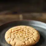 Close-up of freshly baked peanut butter cookies on a minimal background