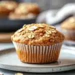 Close-up of freshly baked protein muffins on a wooden board
