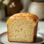 Close-up of gluten-free sandwich bread with a golden crust, perfect for homemade sandwiches.