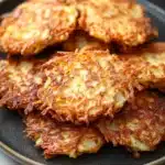 Close-up of vegan potato latkes cooked in an air fryer with a crispy texture