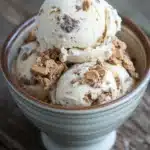 Close-up of peanut butter cookie ice cream with a creamy texture and cookie pieces