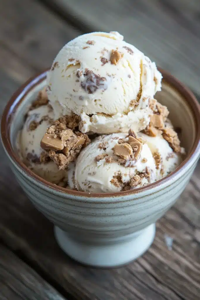 Close-up of peanut butter cookie ice cream with a creamy texture and cookie pieces
